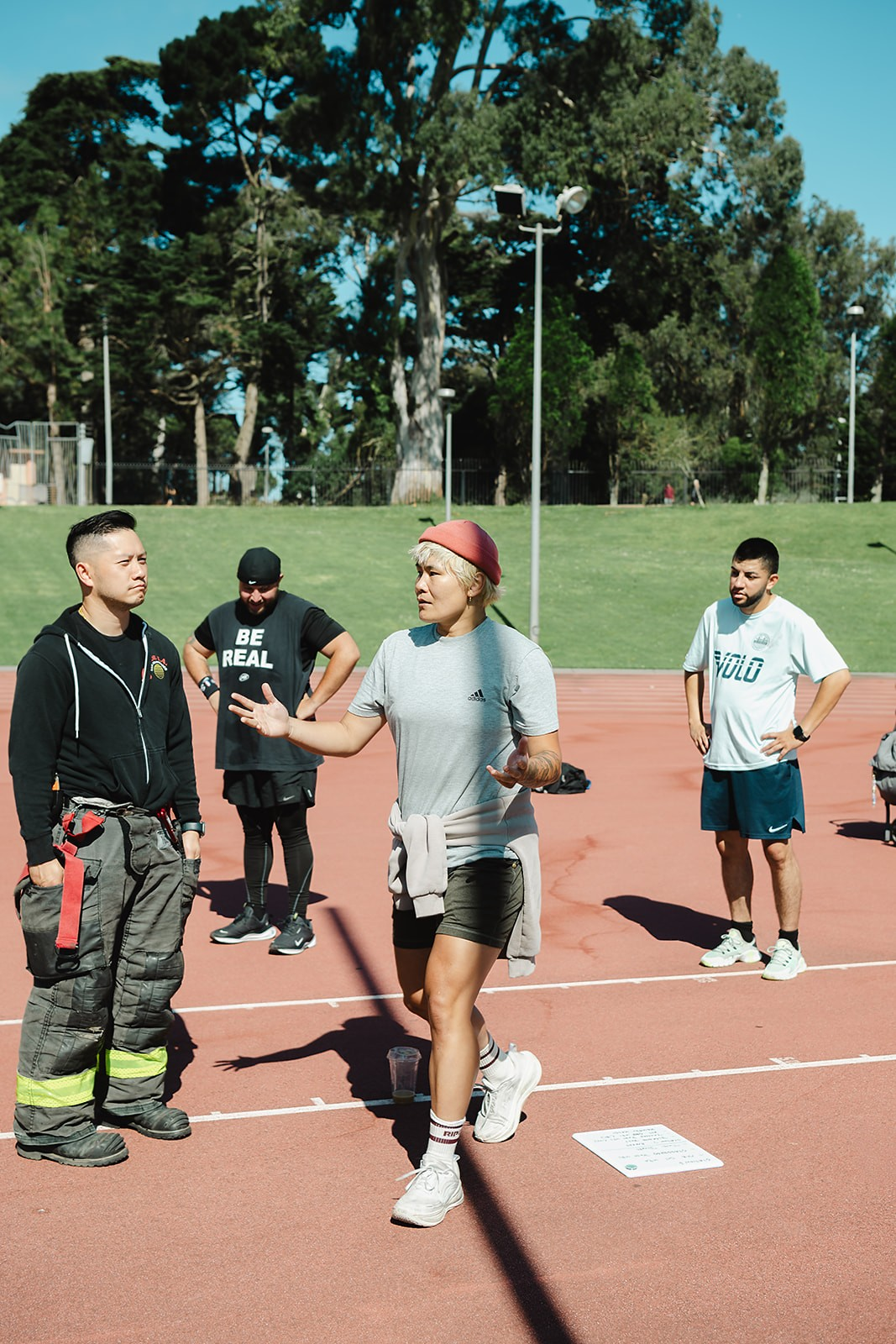 Coach Nan briefing the group before a bootcamp session